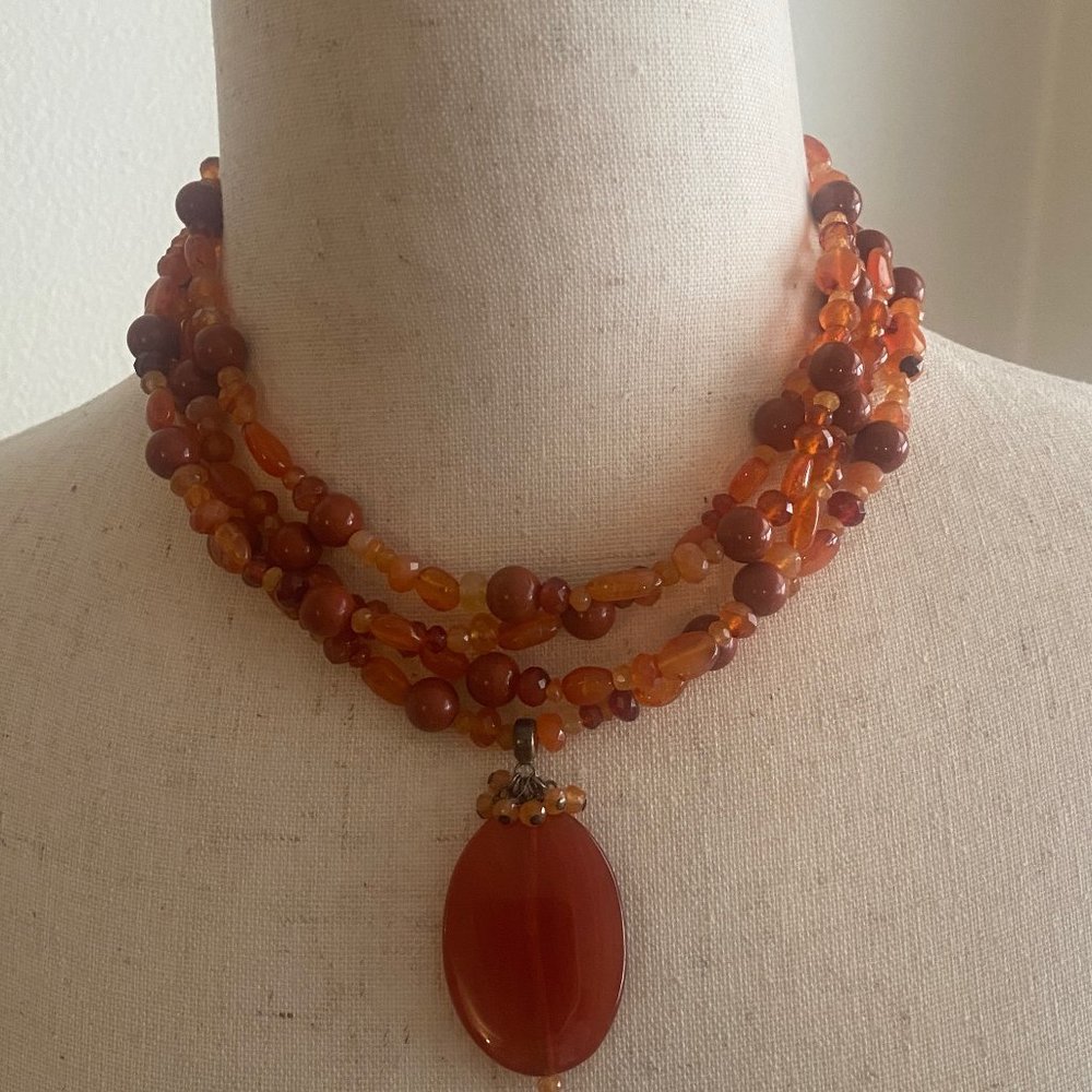 Carnelian adjustable necklace and matching drop earrings. Brand is Kalan.